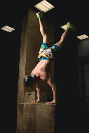 Handstand push-up man workout at gym pus ups