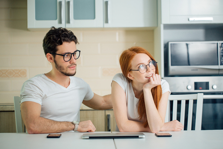 couple dream, think using laptop, looking upの写真素材