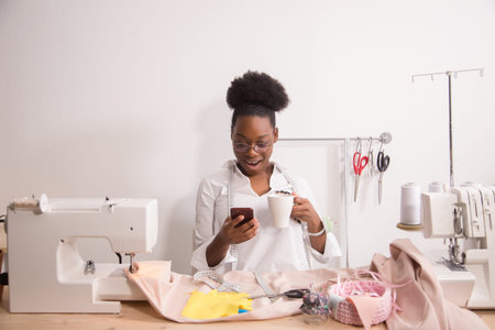 young tailor woman in tailoring workshop