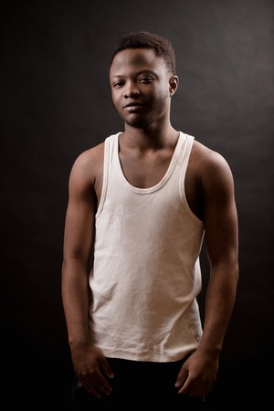 attractive sporty look guy with dark thick hair and dark skinの写真素材