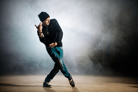 teenager in casual clothers improvising in dance outdoorの写真素材