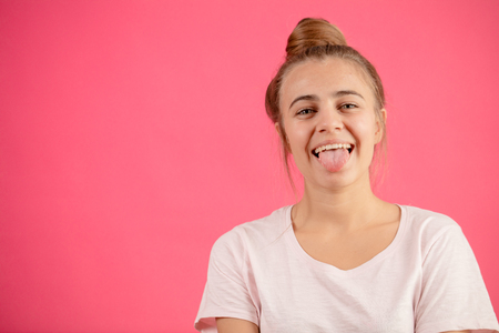 funny female with hair-raising lolling outの写真素材