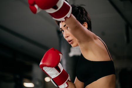 female kickboxer is going in for kickboxingの写真素材