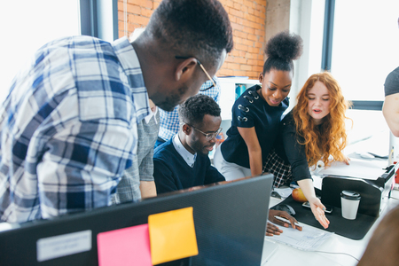 group of young entrepreneurs making up new ideas about businessの写真素材
