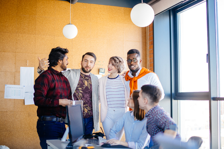 united team members are making plans for weekendsの写真素材