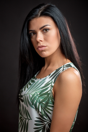 close up portrait of beautiful brunette model with brown eyesの写真素材