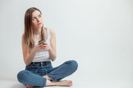 close up portrait of beautiful woman making up an excuseの写真素材