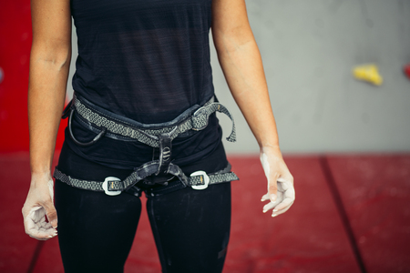 Close up climbing equipment on a womanの写真素材
