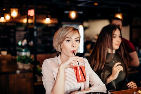 fashion interior photo of attractive woman with blond hairの写真素材