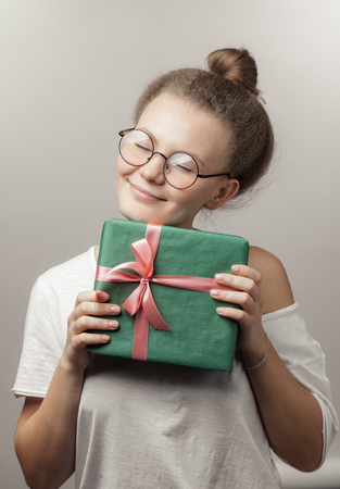 happy birthday. awesome girl has got a present from her friendsの写真素材
