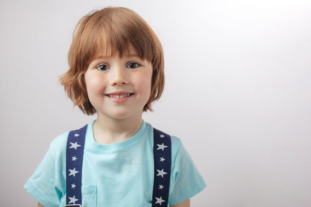 smiling handsome boy with a kind smile.