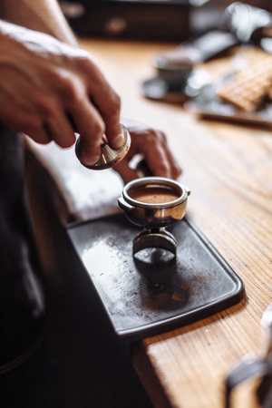 coffee powder in the tamper.の写真素材