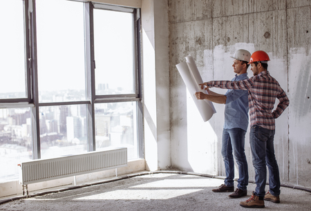 attractive architector and engineer are planning their work. architectural workの写真素材