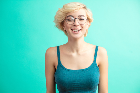Happy Blonde Woman Laughing.の写真素材