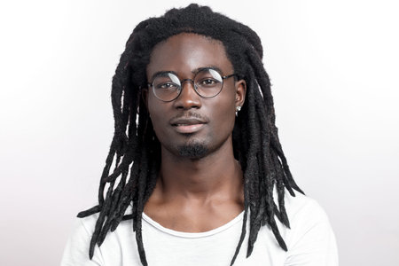 muscular black man looking camera on white backgound