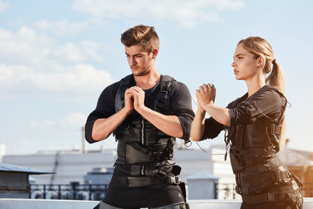 fit young people are concentrated on EMS trainingの写真素材