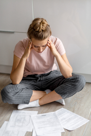young female student trying to learn information.の写真素材