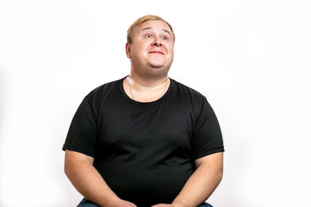 Funny picture of plump man on background. businessman doing selfie.の写真素材