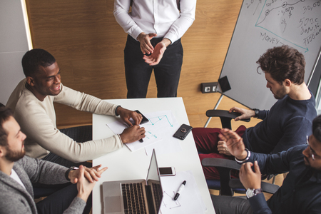 Group of business people in the modern conference room discuss work results.の写真素材