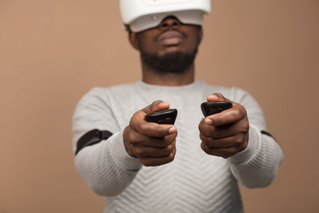 Man in VR glasses now is playing 3D game but Mankind stands on the threshold of a new era of...