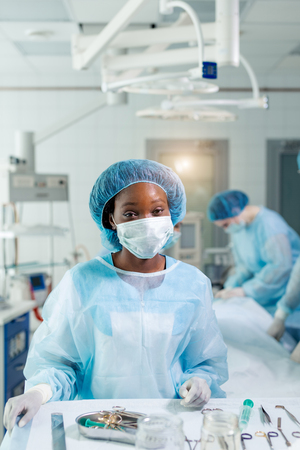 happy attractive first-rate surgeon after doing operation . close up portrait.people conceptの写真素材