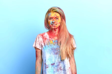 gorgeous girl spending funny time on holiday, event concept. studio shotの写真素材