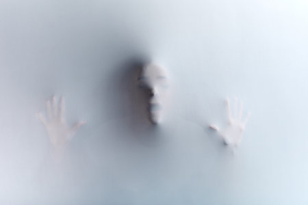 Shadow blur of dangerous man showing his fear. close up photo. white and black photo. the last...