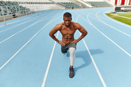 well-built man concentrated on trainig process, full length photo.strength training