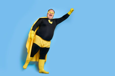 young caucasian fat man with happy face looks at camera and smile, man is grateful, wearing...