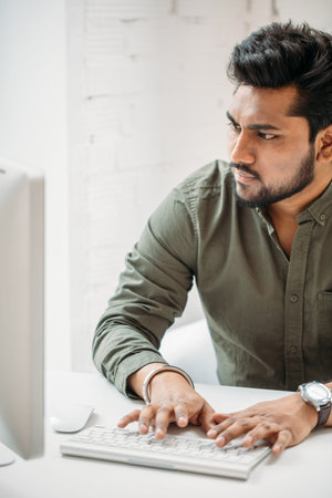 creative man with pc computer working at modern office