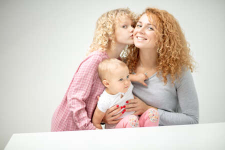 Mother and kids close up background.の写真素材