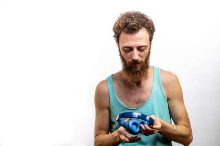 DJ  enjoying music, isolated over white backgroundの写真素材