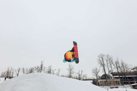 ambitious talented snowboarder performing a jump, lifestyle, dangerous sport, dangerous sport, hobbyの写真素材