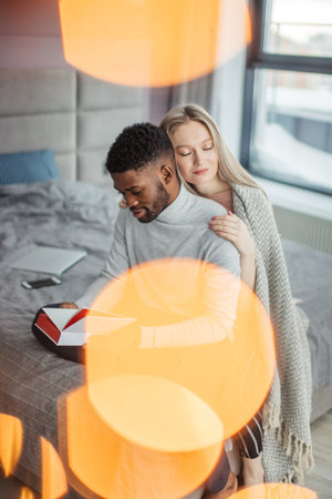 Multi-ethnic young lovers give each other more love and tenderness especially when it is cold winter...