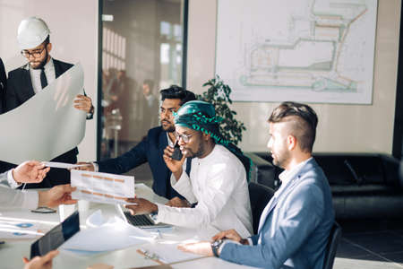 business meeting, collaboration, engineering, architecture construction teamwork and people conceptの写真素材