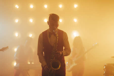 young celebrity on the stage. close up photo.woodwind instrument. classical musicの写真素材