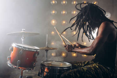 energetic of rock music. euphoria from music. battle concept. side view shotの写真素材