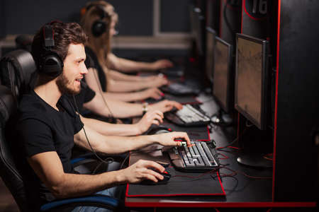 Leading esport team mousesports training together in a e-sport club getting prepared to online Cyber Games Tournament and have all chances to beat their opponents in upcoming contest.の写真素材