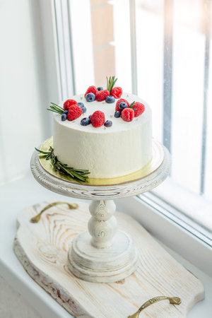 Caramel tasty cheesecake with strawberry and raspberries. tasty dessert for guests. close up phot