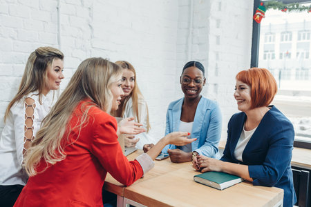 Young mixed race women team up with freelance friends and create a small coworking club that can...