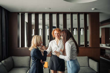 Business woman having discussion at office lobby.の写真素材
