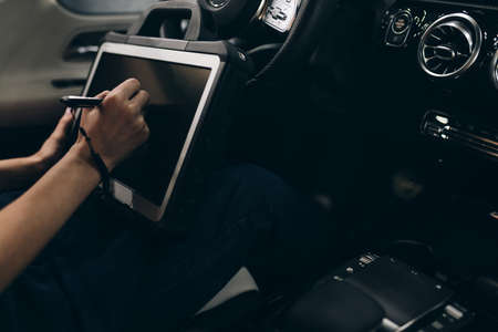 close up cropped photo. womans hands holing a tablet.new technologyの写真素材