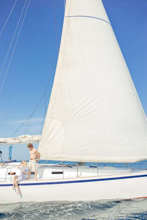 Sailing boat yacht closeup on blue water sea.の写真素材