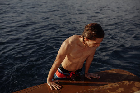 This young popular blogger man likes to find an escape from the city sailing deep in the open sea,...