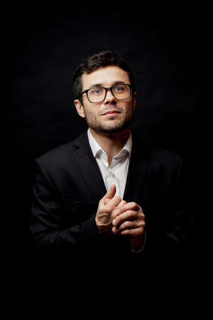 young pleasant man is distrressed for the company problems.rich man is in declineの写真素材