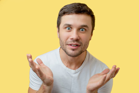 crazy shocked male, looking at camera with bugged eyes. argue with gestures. man is trying to...