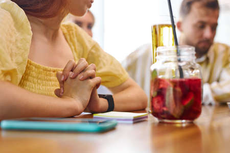 close-up photo of female hands and sweet beverage in cafe, drinks and food, meal concept.の写真素材