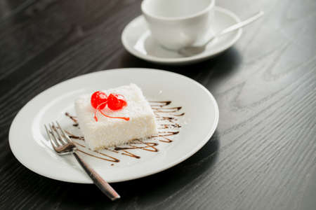 image of yummy cake with cocounat flakes and jam. perfect baked dessert. food for good moodの写真素材