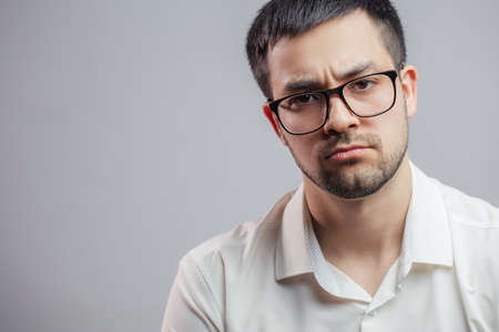 sorrorful bearded guy .depression of spirit. man fell into a deep depression on hearing the information. copyspaceの写真素材