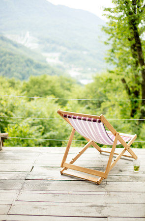 sunded with amazing, breathtaking landscape, forest and mountain on the background of the...